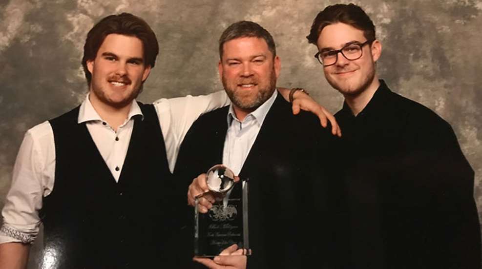 A photo of Bob Milligan receiving the North American Professional Hunter of the Year award in 2018